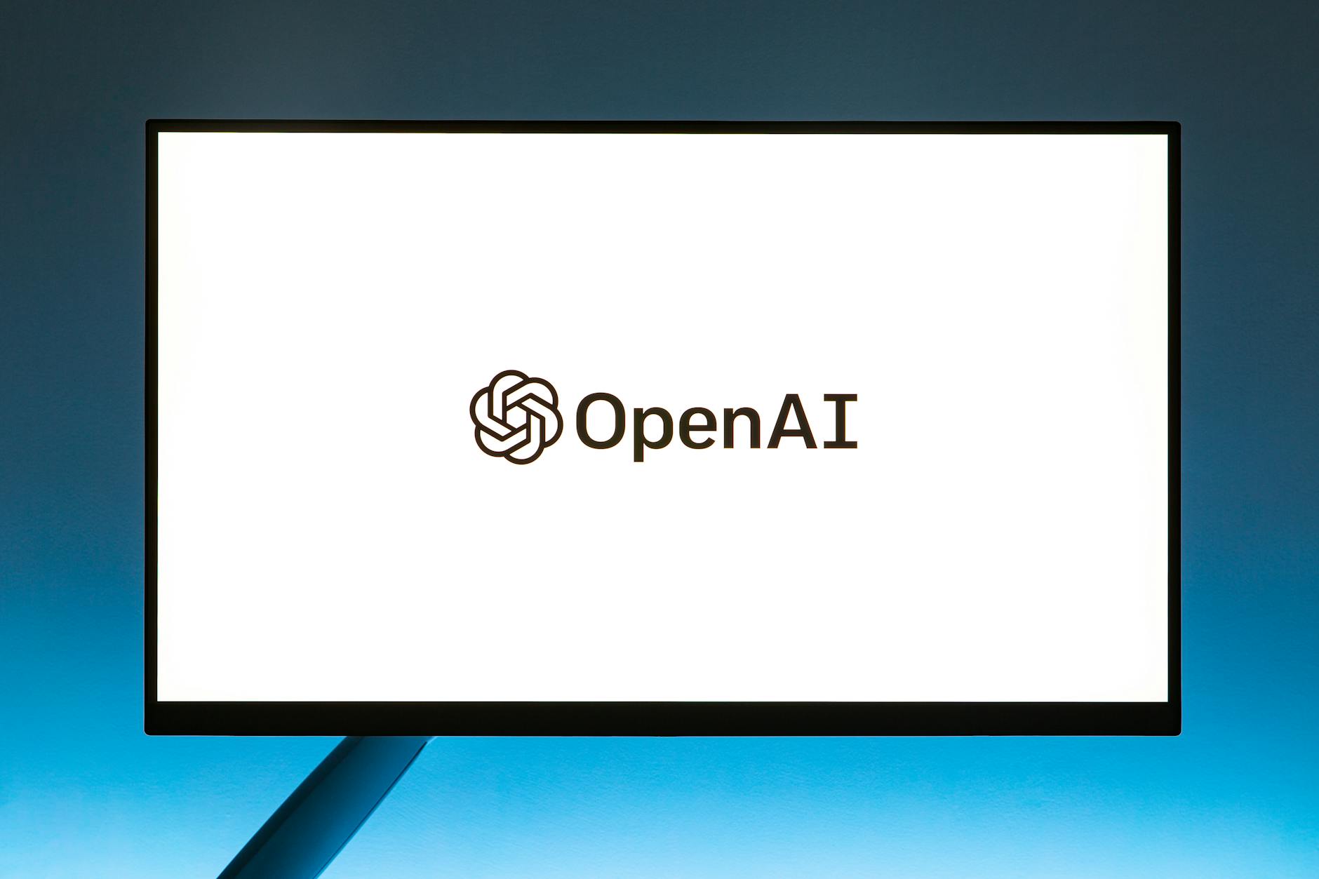 Computer Monitor with OpenAI Website Loading Screen