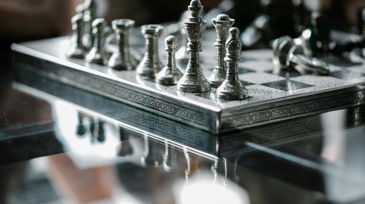 Metal carved chess board with set pieces