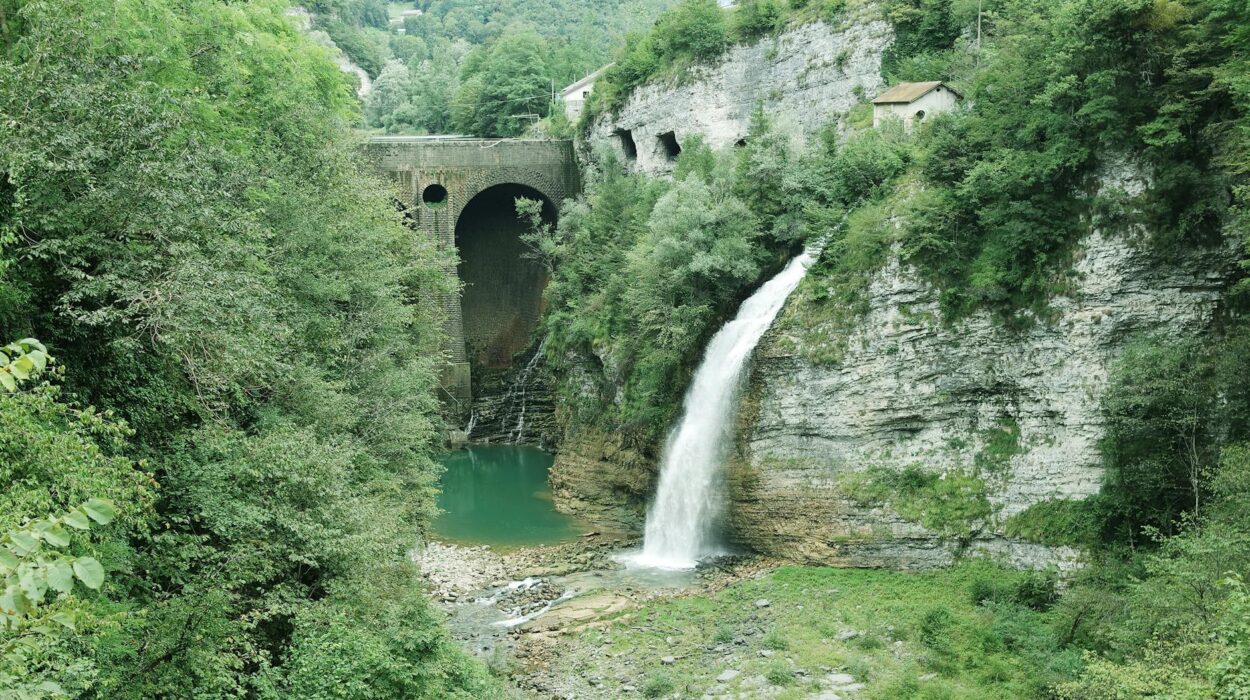 View of the Serra Bridge WaterfallTrasaZapisz near Lamon, Italy