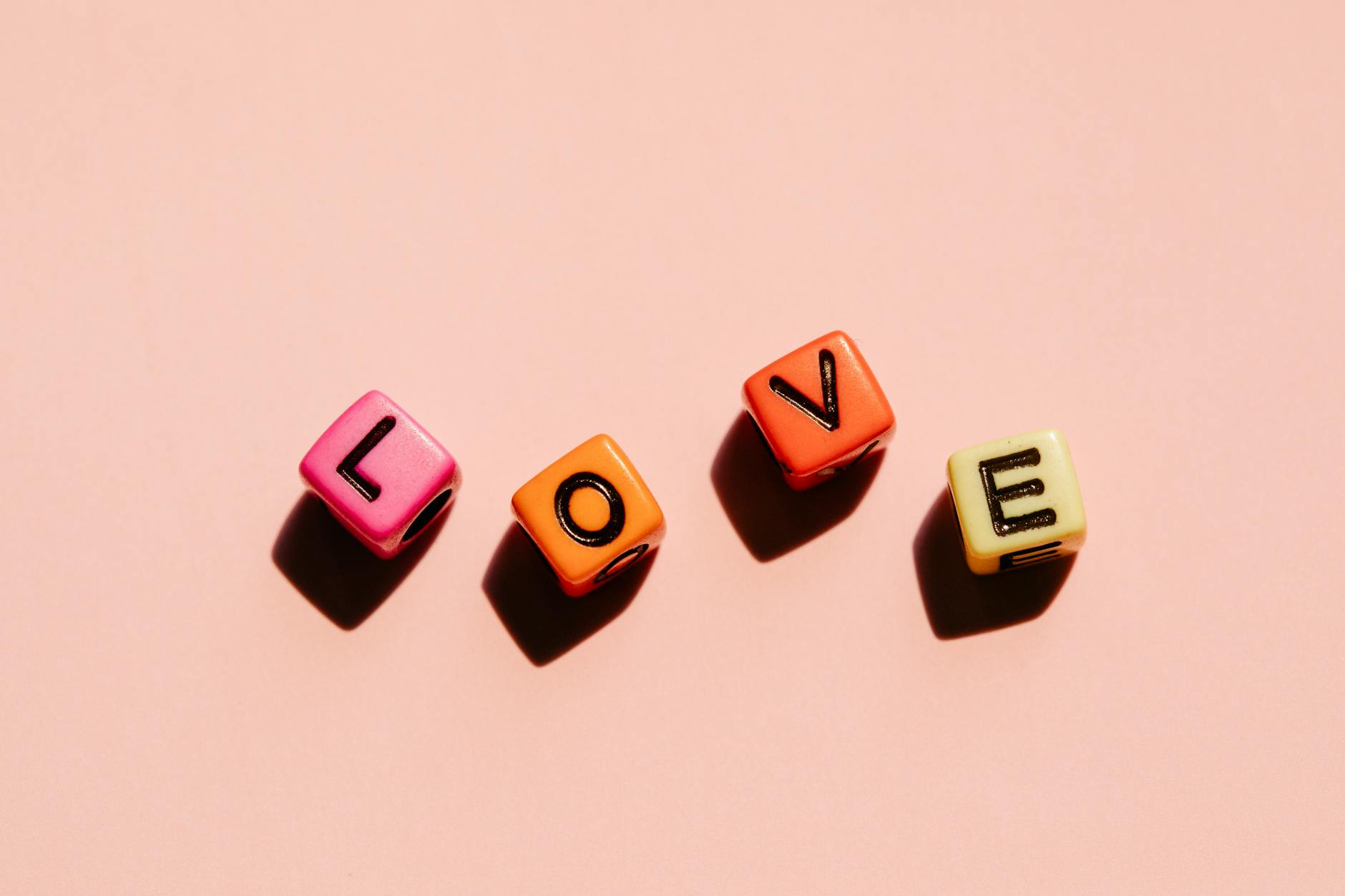 Colorful dice with Love inscription